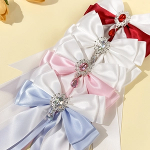 Elegant satin bow hair clip with crystal pendant and gemstone inlay for women