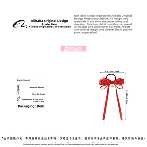 Detail showing dimensions of red silk bow hair tie with pearl pendant, 13cm width