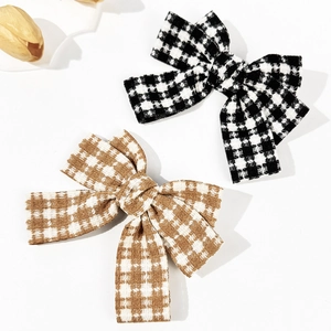 Elegant houndstooth bow hair clips set in black and brown tweed for women accessory