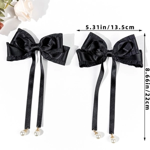 Detail of Lolita hair bow with long ribbons and pearl pendants showing 22cm length