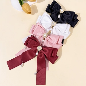 Elegante Haarklammern mit Schleife und Perlenanhängern in Schwarz, Weiß, Rosa und Weinrot