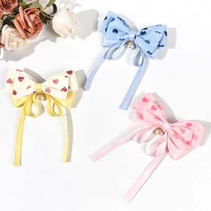 Barrettes à nœuds en ruban avec motifs cœurs et perles pendantes en trois tons pastel