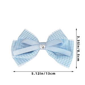 Detailed view of blue gingham bow hair clip with silver heart and 13cm size dimensions