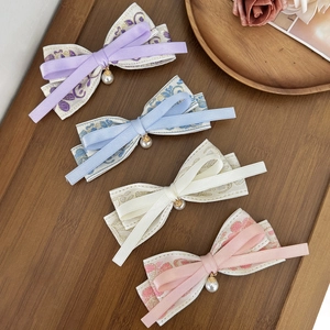 Floral embroidered bow hair clips with pearls in purple blue white and pink colors