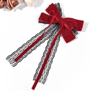 Gothic velvet and lace bow hair clip with red and black ribbons for elegant hair styling