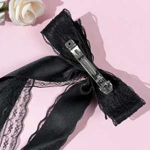 Barrette à cheveux élégante en dentelle noire avec ruban long et pince en métal