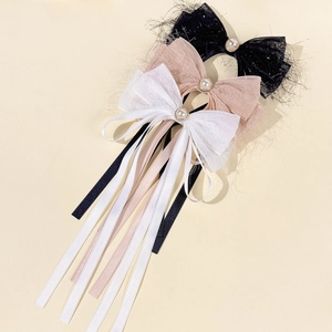 Three-piece set of elegant bow hair clips with pearls and long flowing tassels