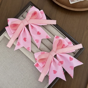 Nœuds à cheveux roses avec motifs de cœur et longs rubans pour filles en coffret