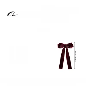 Detail showing dimensions of burgundy velvet bow hair clip with 17cm width and 29.5cm length