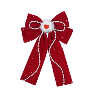 Red velvet bow hair clip with pearl chains and heart pendant for festive occasions