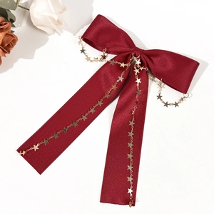 Barrette à cheveux en satin bordeaux avec pampilles de chaînes d'étoiles dorées