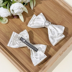 Set de pinzas para el pelo con lazos de lunares y corazón de strass con clip de metal