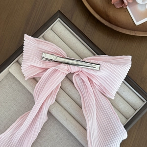 Elegant light pink pleated silk bow hair clip with long ribbons and metal duckbill clip