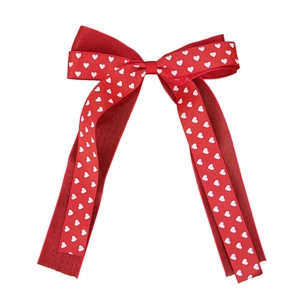 Nœud à cheveux rouge avec motifs de cœurs blancs et rubans de soie pour la Saint-Valentin