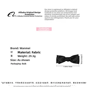 Detail showing dimensions and weight of the black satin bow hair clip for styling