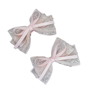 Pink lace bow hair clips with layered satin ribbons for women in sweet princess style