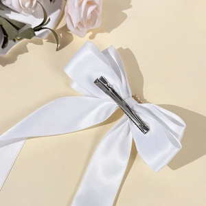 Elegant white satin ribbon bow hair clip with double long streamers and metal duckbill clip