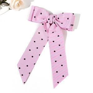 Pink and white striped bow hair clip with black hearts and long ribbons for women