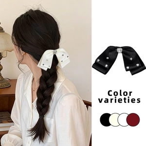Elegant satin bow hair clip with rhinestone heart for women in black and beige colors
