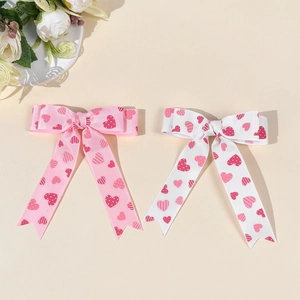 Haarspangen-Set mit langen rosa und weißen Bändern und Herzmuster für Mädchen