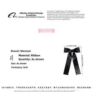 Size specifications and macro dimensions of the black polka dot bow hair clip with ribbons