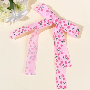 Barrette à cheveux rose avec imprimé cerise fraise et élégants longs rubans pendants