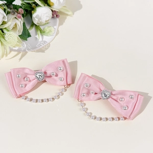 Pinces à cheveux nœud rose avec strass en cœur et élégantes franges perlées