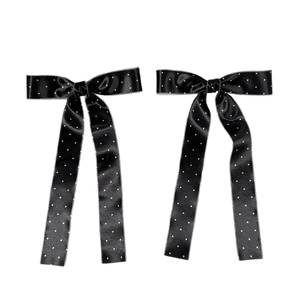 Paire de barrettes à nœuds noirs à pois avec bordure pailletée et rubans style ballerine douce