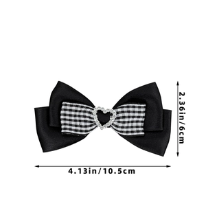 Detail showing dimensions of 4.13 by 2.36 inches for the heart rhinestone bow hair clip
