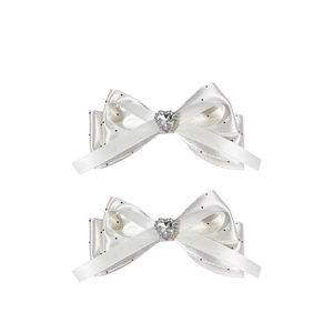 Set of two sweet white satin bow hair clips with black polka dots and heart rhinestones