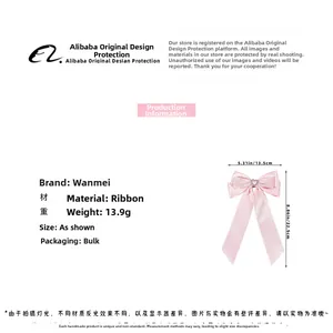 Barrette nœud rose avec strass en cœur et mesures de taille détaillées