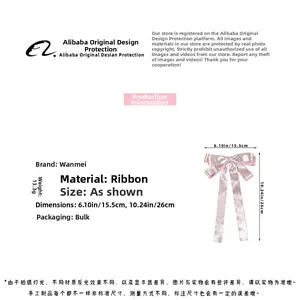 Barrette à nœud en satin rose à pois avec dimensions détaillées et spécifications