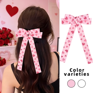 Fermaglio per capelli con fiocco rosa e cuori con nastri lunghi per San Valentino