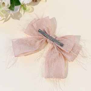 Barrette à cheveux nœud rose clair élégante avec franges plume pour accessoires femme