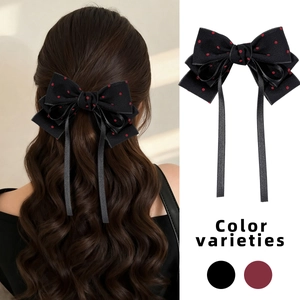 Elegant red polka dot bow hair clip with long satin ribbons for women's hairstyles
