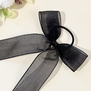 Elegant black mesh ribbon bow hair tie for women with sparkling organza texture