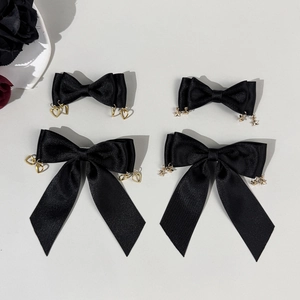 Gothic style black satin hair bows set with gold heart and star pendants for women