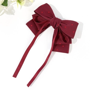 Elegant red polka dot bow hair clip with long streamers for women vintage style