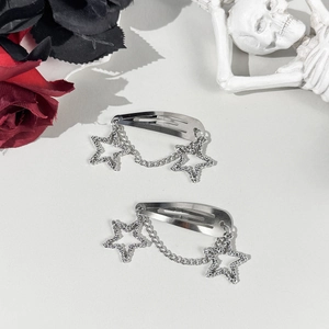 Punk style silver hollow star chain hair clips set with goth aesthetic on white background
