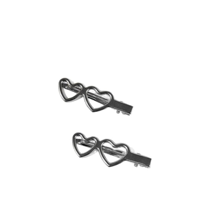 Barrettes à cheveux en métal argenté en forme de cœur au design épuré poli