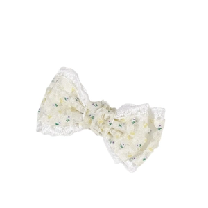 Fermaglio a fiocco in pizzo beige con motivo floreale in stile bucolico e raffinato
