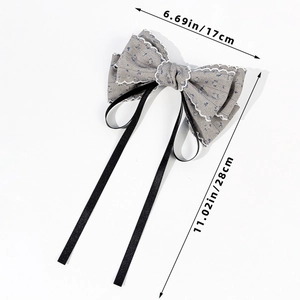 Elegant floral bow hair clip with lace trim and long black ribbons for women