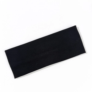 Macro shot of 8cm wide black ribbed knitted fabric texture on an elastic yoga headband