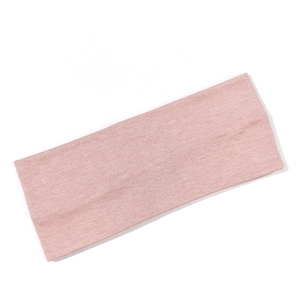 Close-up of pink ribbed knit texture on 8cm elastic sports yoga headband for women