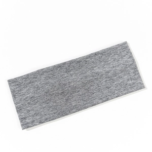Close-up of heather gray knitted sports headband with soft ribbed cotton texture