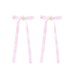Pink satin ballet hair clips with delicate daisy embroidery and long flowing ribbons