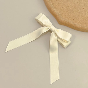 Elegant cream double-layered satin bow hair clip with long ribbons for a graceful look