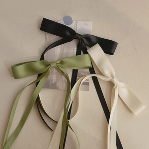 Elegant satin ribbon bow headband set in black, grass green, and creamy white colors