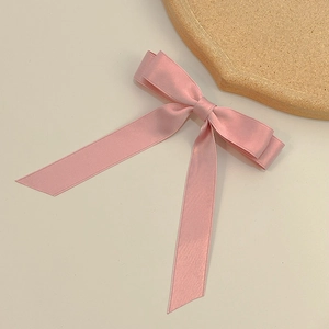 Elegant double-layered pink satin bow hair clip with long ribbons for women