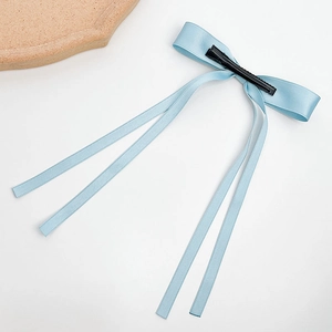 Light blue satin ribbon bow hair clip with long streamers and metal alligator clip for women